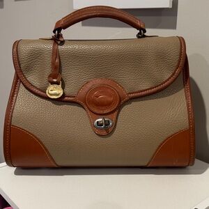 Dooney & Bourke vintage leather handbag with suede interior lining